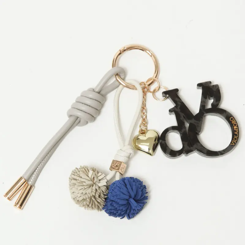 VIOLAd'ORO ヴィオラドーロ BIANCA ロゴアクリル×コード バッグチャーム グレー/ブルー