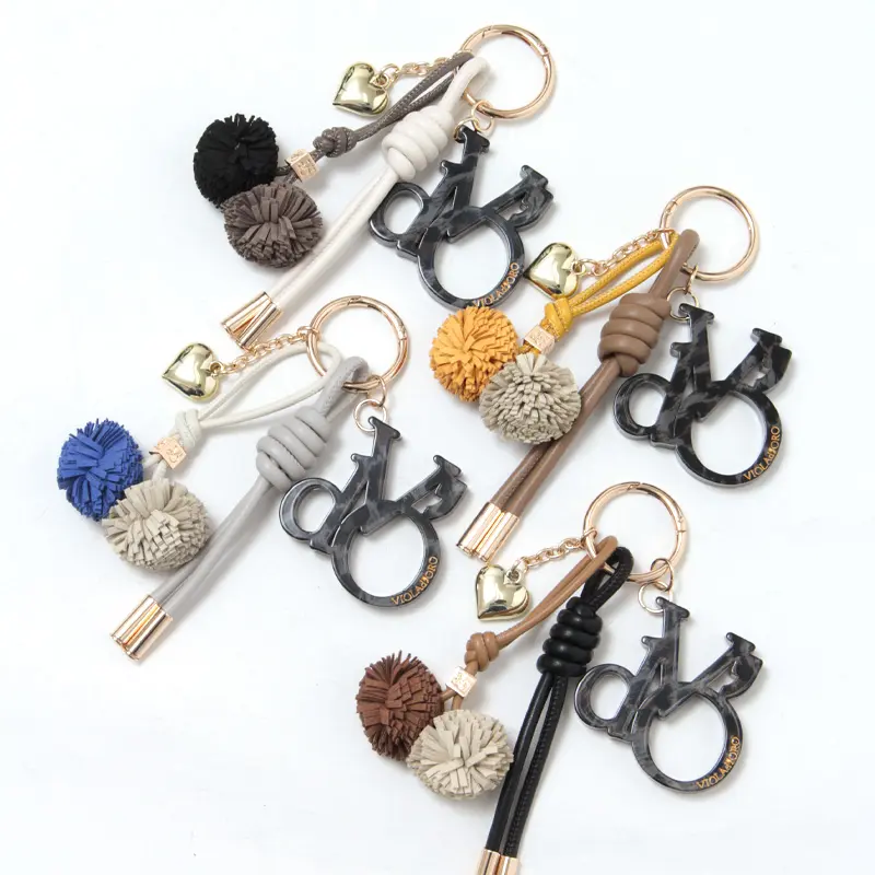 VIOLAd'ORO ヴィオラドーロ BIANCA ロゴアクリル×コード バッグチャーム